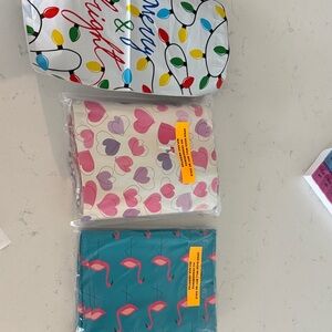 Flamingo, Heart and Merry Christmas polly bag mailers 10 x 13 100 of each.